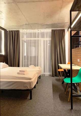 Отель Loft Hotel Буковель Двухместный номер с 1 кроватью или 2 отдельными кроватями-6